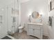 Light and airy bathroom with a walk-in shower, vanity with framed mirror, and a towel rack at 4105 Gnarled Oaks Ln, Johns Island, SC 29455