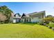 Beautiful home with a manicured lawn, inviting entryway and a well designed front yard at 4105 Gnarled Oaks Ln, Johns Island, SC 29455