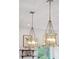 Unique pendant lights add a touch of elegance to the kitchen space at 4105 Gnarled Oaks Ln, Johns Island, SC 29455