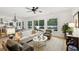Spacious living room with water views, comfortable seating, and an open layout perfect for gatherings at 4105 Gnarled Oaks Ln, Johns Island, SC 29455