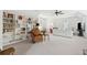 Bright and airy living room with built-in shelving and comfortable seating, illuminated by natural light at 4105 Gnarled Oaks Ln, Johns Island, SC 29455