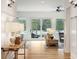 Bright living room with hardwood floors, a ceiling fan, and lots of natural light at 4105 Gnarled Oaks Ln, Johns Island, SC 29455