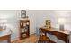 Charming home office with a wooden desk, bookshelf, and a warm, inviting atmosphere at 4105 Gnarled Oaks Ln, Johns Island, SC 29455