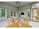 Outdoor patio with comfortable seating and a ceiling fan for relaxing and entertaining guests at 4105 Gnarled Oaks Ln, Johns Island, SC 29455