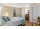 Bedroom features a large bed, hardwood floors, and windows for natural light at 47 Drake St, Charleston, SC 29403