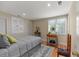 Bedroom features a large window, closet, and hardwood floors at 47 Drake St, Charleston, SC 29403