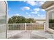 Enjoy relaxing balcony with marsh view, outdoor furniture, and natural light at 4935 Sound View Dr, Mount Pleasant, SC 29466