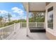 Enjoy the views from this home's private outdoor balcony with lounge seating at 4935 Sound View Dr, Mount Pleasant, SC 29466