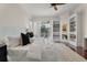 Bright and airy bedroom with a large, comfortable bed and built-in shelving at 4935 Sound View Dr, Mount Pleasant, SC 29466