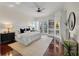 Serene bedroom with built-in shelving and access to a private balcony at 4935 Sound View Dr, Mount Pleasant, SC 29466