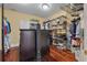 This walk-in closet features hardwood floors and built-in shelving at 4935 Sound View Dr, Mount Pleasant, SC 29466