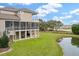 Stunning home with a screened porch, balcony, and tranquil pond view at 4935 Sound View Dr, Mount Pleasant, SC 29466