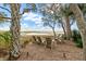Cozy outdoor fire pit area with Adirondack chairs and views of the marsh at 4935 Sound View Dr, Mount Pleasant, SC 29466