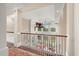 Open foyer with a view to the downstairs living area featuring hardwood floors and soaring ceilings at 4935 Sound View Dr, Mount Pleasant, SC 29466