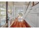 Bright and airy foyer with hardwood floors and elegant staircase at 4935 Sound View Dr, Mount Pleasant, SC 29466