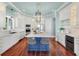 Modern kitchen with white cabinets, stainless steel appliances, and a large island with seating at 4935 Sound View Dr, Mount Pleasant, SC 29466