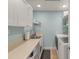 Functional laundry room featuring washer, dryer, and ample counter space at 4935 Sound View Dr, Mount Pleasant, SC 29466