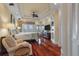 This spacious main bedroom features hardwood floors, french doors, and tray ceilings at 4935 Sound View Dr, Mount Pleasant, SC 29466