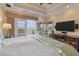 This primary bedroom features hardwood floors, french doors, and waterfront views at 4935 Sound View Dr, Mount Pleasant, SC 29466