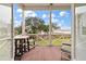 Inviting porch with views of the marsh featuring comfortable seating for relaxing and enjoying the outdoors at 4935 Sound View Dr, Mount Pleasant, SC 29466
