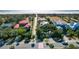 An aerial view of homes near the beach and golf course, showcasing lush trees and nice landscaping at 5 25Th Ave, Isle of Palms, SC 29451