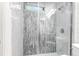 Shower featuring designer tiles and a modern glass enclosure at 5 25Th Ave, Isle of Palms, SC 29451