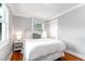 Cozy bedroom with hardwood floors and a plush king-sized bed at 5 25Th Ave, Isle of Palms, SC 29451
