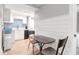 Kitchenette with compact appliances, a small table, and stylish blue backsplash at 5 25Th Ave, Isle of Palms, SC 29451