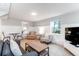 Cozy living room with comfortable seating, a TV, and a table for dining at 5 25Th Ave, Isle of Palms, SC 29451