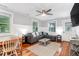 Cozy living room with hardwood floors, a comfortable sofa, and ample natural light at 5 25Th Ave, Isle of Palms, SC 29451