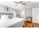 Beautiful main bedroom suite offers a king bed, artwork, and hardwood flooring at 5 25Th Ave, Isle of Palms, SC 29451
