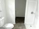 Bathroom with white fixtures and a view into the next room at 5056 Butler St, North Charleston, SC 29406