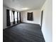 Bright and expansive living room featuring modern gray carpeting and a well-lit, airy feel at 5056 Butler St, North Charleston, SC 29406