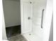 Bathroom shower with grab bar, white shower stall, and neutral walls at 5056 Butler St, North Charleston, SC 29406