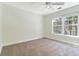 Bedroom with carpet, ceiling fan and large windows at 506 Cecilia Cove Dr, Charleston, SC 29412