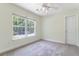 Bedroom with carpet, window, ceiling fan and closet at 506 Cecilia Cove Dr, Charleston, SC 29412