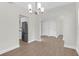 Open floor plan showcasing a dining room with a view into the kitchen at 506 Cecilia Cove Dr, Charleston, SC 29412