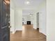 Welcoming entryway featuring hardwood floors and a view into a spacious living room with a fireplace at 506 Cecilia Cove Dr, Charleston, SC 29412