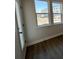 Bright bedroom with wood flooring, double windows and a door at 5122 Double Eagle, Summerville, SC 29485