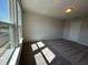 Bright bedroom features large windows and neutral carpeting, ready for personalization and comfort at 5122 Double Eagle, Summerville, SC 29485