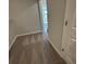 Hallway with carpet floors leading to a bright room with a window at 5122 Double Eagle, Summerville, SC 29485