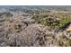 Overhead view of home surrounded by diverse, dense trees and vegetation at 5219 Maybank Hwy, Wadmalaw Island, SC 29487