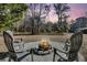 Backyard scene with a cozy fire pit area and seating at 5219 Maybank Hwy, Wadmalaw Island, SC 29487