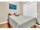 Bedroom features neutral decor, closet and wood floor at 5219 Maybank Hwy, Wadmalaw Island, SC 29487