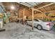 This garage features a car lift, ample lighting, and a workbench at 5219 Maybank Hwy, Wadmalaw Island, SC 29487