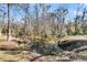 Peaceful view of pond surrounded by trees at 5219 Maybank Hwy, Wadmalaw Island, SC 29487