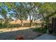 Scenic backyard featuring marsh views, lush trees, and a tranquil outdoor setting at 607 Saint Charles Ct, Charleston, SC 29407