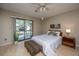Cozy bedroom featuring natural light from large windows, creating a peaceful retreat for relaxation and rest at 607 Saint Charles Ct, Charleston, SC 29407