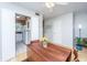 Bright dining area featuring a wooden table, hardwood floors, and a view into the kitchen, perfect for casual meals at 607 Saint Charles Ct, Charleston, SC 29407