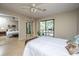 The main bedroom offers a large closet, a private balcony and plenty of natural light at 607 Saint Charles Ct, Charleston, SC 29407